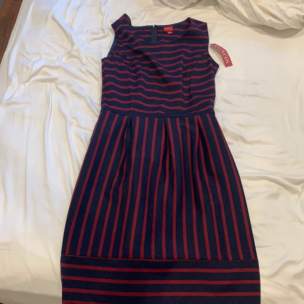Medium new with tags. Cute dress, never worn